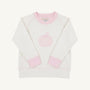 The Cassidy Comfy Crewneck by The Beaufort Bonnet Company is shown laid flat on a plain white background. This cozy sweatshirt features a Palmetto Pearl body with Palm Beach Pink accents on the cuffs, collar, and hem, and is adorned with a pink gingham pumpkin applique on the chest.