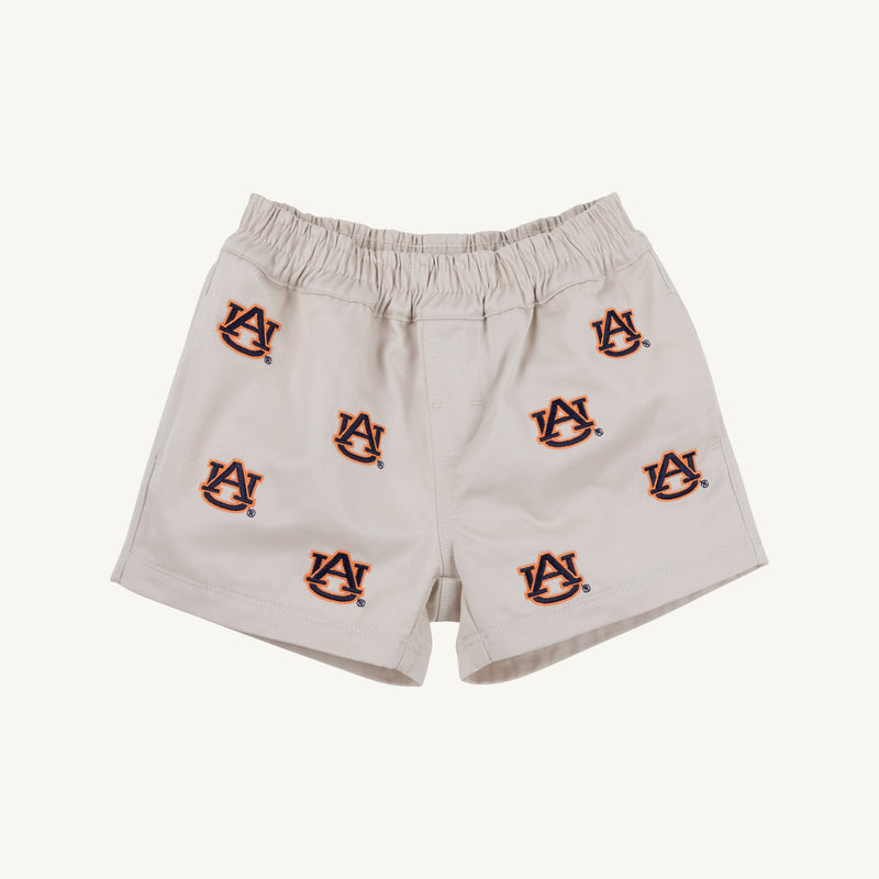Auburn Critter Sheffield Shorts in Saratoga Stone by The Beaufort Bonnet Company, featuring multiple embroidered Auburn University logos in orange and navy blue on a plain white background. Ideal as kids’ gameday shorts or classic Auburn logo shorts.