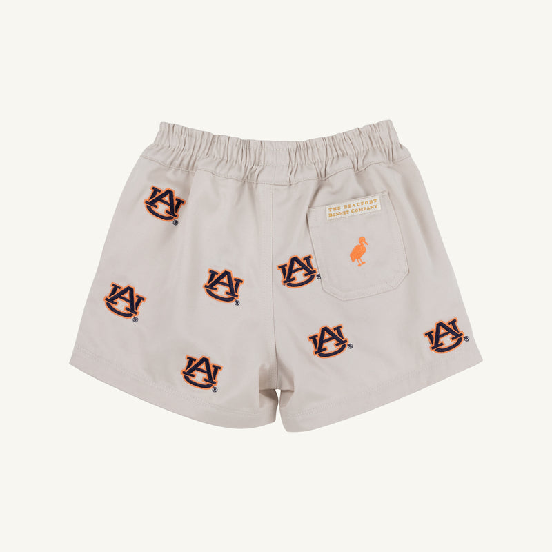Auburn Critter Sheffield Shorts in Saratoga Stone by The Beaufort Bonnet Company feature an elastic waistband, repeated orange and navy blue Auburn University AU logos, and a small patch with text and an orange bird above the back pocket.