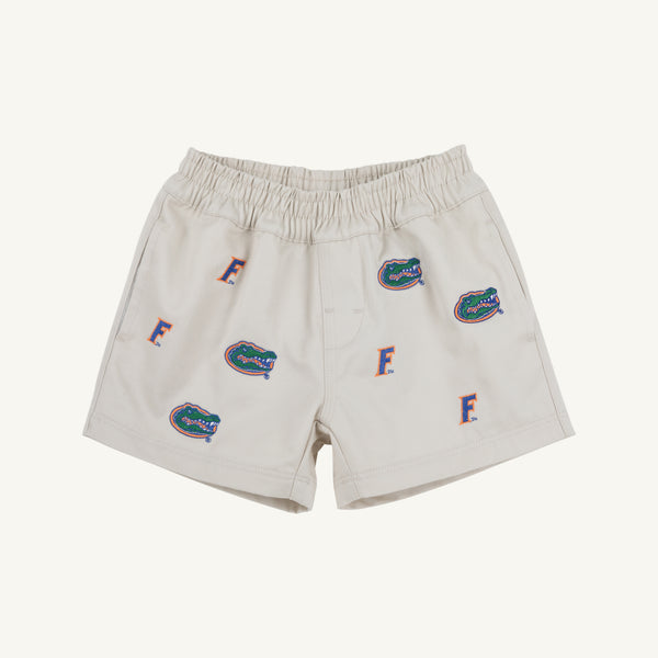 The Beaufort Bonnet Company Florida Critter Sheffield Shorts in Saratoga Stone feature an elastic waistband and are adorned with multiple embroidered green alligators and orange F Florida logo designs, perfect for kids’ gameday.