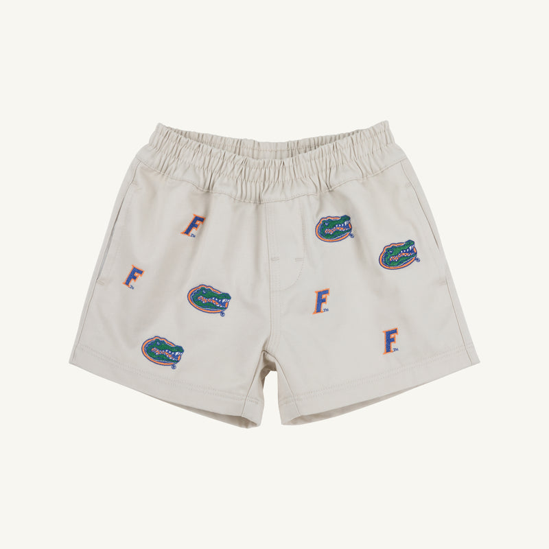 The Beaufort Bonnet Company Florida Critter Sheffield Shorts in Saratoga Stone feature an elastic waistband and are adorned with multiple embroidered green alligators and orange F Florida logo designs, perfect for kids’ gameday.