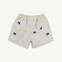 The Beaufort Bonnet Company’s Michigan Critter Sheffield Shorts in Saratoga Stone feature an elastic waistband, embroidered blue and yellow Michigan logos, and a small back pocket with a label and bird icon. These shorts combine comfort and school spirit for any fan.
