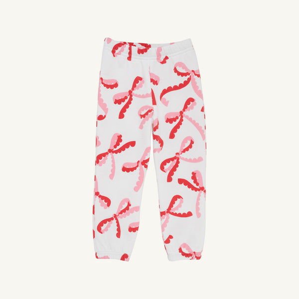 Gates Sweeney Sweatpants - Bonnie Scot Bows are cozy fleece-lined white sweatpants featuring an all-over print of red and pink scalloped ribbon bows and elastic cuffs.