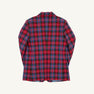 The Grandccasion™ Booker Blazer - Bucktown Tartan with Barrington Blue by The Beaufort Bonnet Company is a men’s blazer in vibrant Bucktown Tartan, highlighting a red plaid pattern accented with blue, green, and yellow stripes. Shown laid flat on a white background, the image displays the back side of the blazer.