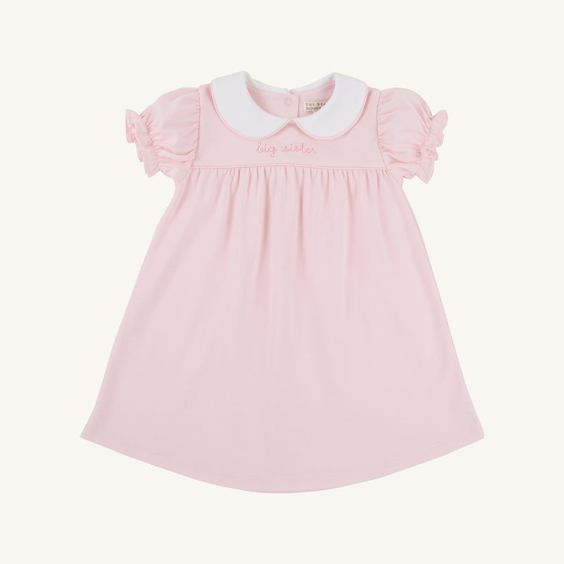 Holly Day Dress in Palm Beach Pink with Hamptons Hot Pink Big Sister embroidery, featuring a pink short-sleeved pima cotton design with a white Peter Pan collar.