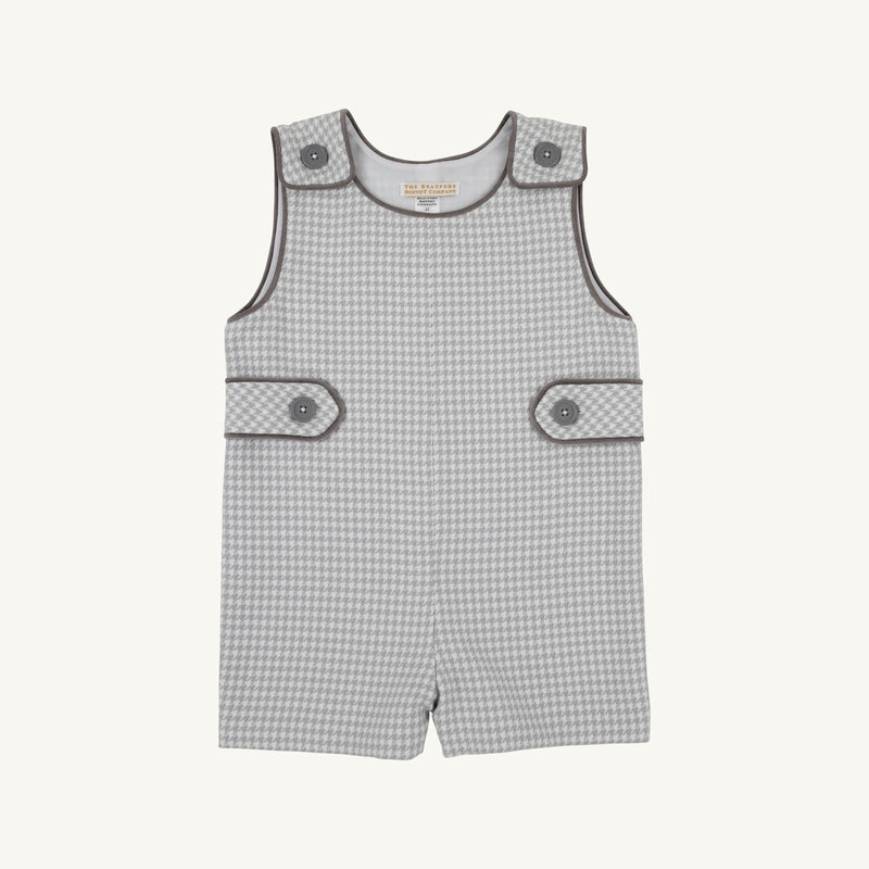 Jack Keene Jon Jon - Grantley Gray Houndstooth with Grantley Gray romper featuring gray and white houndstooth, buttoned shoulders and sides, and dark gray piping trim, perfect for a winter family portrait.
