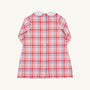 Back view of a Lindy’s Lunch Dress - Broadway Play Plaid with Worth Avenue White, a long-sleeved plaid holiday dress in shades of pink, red, and white, featuring a white rounded collar and a vertical row of buttons down the back.