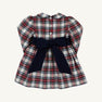Long Sleeve Cindy Lou Sash Dress in Paris Pike Plaid with Nantucket Navy, featuring a rounded collar, three back buttons, and a large navy blue bow at the waist.