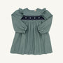 The Long Sleeve Daphne Dress in Grier Green Herringbone by The Beaufort Bonnet Company features ruffled shoulders and navy and white smocked floral embroidery across the chest, shown on a plain white background.