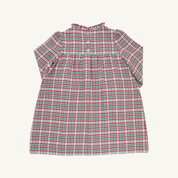 A Long Sleeve Mary Baker Day Dress in Wicker Park Plaid with Richmond Red by The Beaufort Bonnet Company, featuring a ruffled collar and buttons on the upper chest, is displayed on a plain background.