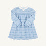 The Beaufort Bonnet Company’s Long Sleeve Mary Dal Dress in Blue Choo Choos with Worth Avenue White features a light blue Pima Cotton Knit design, a charming Peter Pan collar, and a subtle train pattern. This toddler dress is detailed with gathered waist and sleeve accents for added sweetness.