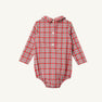 The Beaufort Bonnet Company Long Sleeve Peter Pan Collar Shirt & Onesie in Woodspoint Plaid, with red and green plaid pattern, three white buttons down the front, and a Peter Pan collar, is displayed laid flat on a plain background.