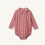 The Beaufort Bonnet Company Long Sleeve Peter Pan Collar Shirt & Onesie in Woodspoint Plaid, featuring red, green, and white tones with snap buttons at the bottom, is displayed on a plain white background.