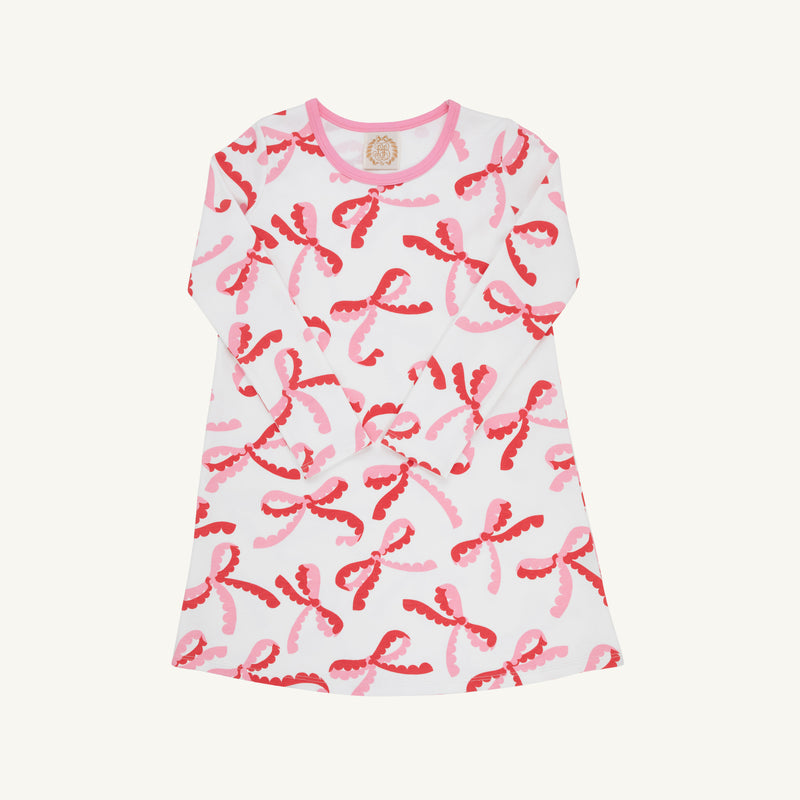 Long Sleeve Polly Play Dress in white Pima cotton knit with a repeating Bonnie Scot bow pattern in pink and red.