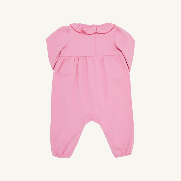 The Long Sleeve Ramona Ruffle Romper - Hamptons Hot Pink with Wreath Embroidery by The Beaufort Bonnet Company is crafted from soft Pima Cotton and features a charming scalloped collar, button details on the chest, and gathered fabric at the waist. Designed for comfort with elastic hems at the legs and wrists, this festive romper makes a perfect holiday outfit and is shown laid flat on a light background.