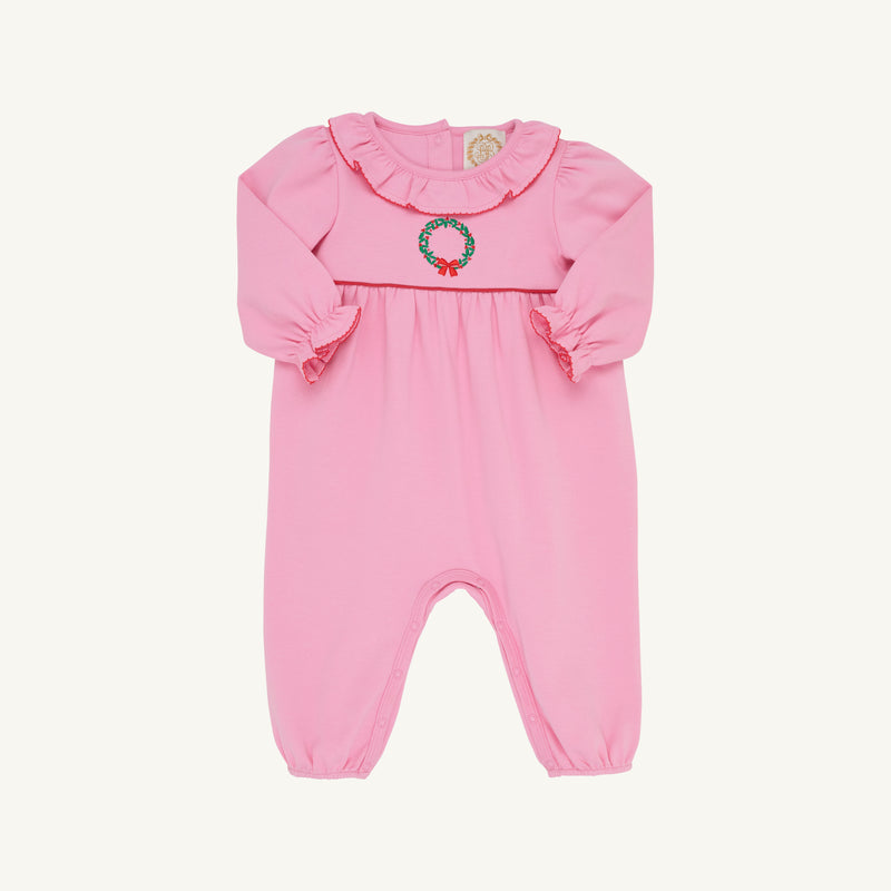 The Beaufort Bonnet Company’s Long Sleeve Ramona Ruffle Romper in Hamptons Hot Pink features a ruffled collar and a delicate wreath embroidery on the chest. Crafted from soft Pima Cotton, this romper is perfect for holiday occasions and is shown against a plain white background.