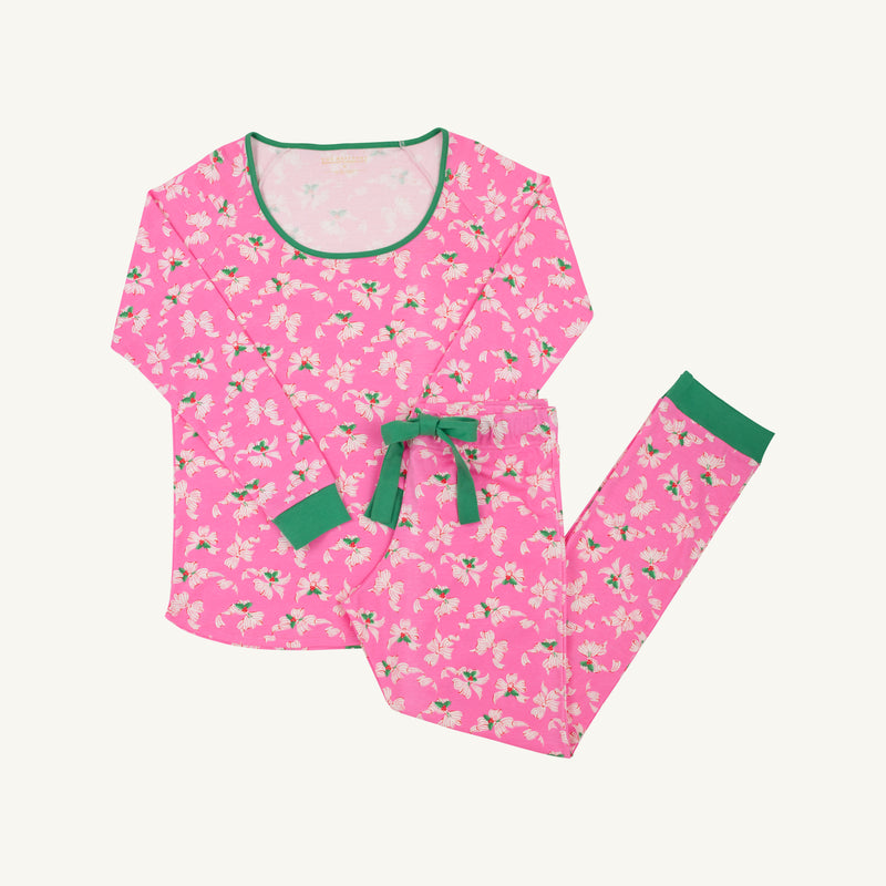 The Beaufort Bonnet Company’s Long Sleeve Stay in Bed Set - Bows of Holly with Kiawah Kelly Green features a cheerful pink pajama set adorned with white floral “bows of holly” and green leaves, complemented by Kiawah Kelly Green trim on the neckline and waistband, plus a matching green waist tie. This festive holiday pajama set includes a long-sleeve top and full-length pants, making it perfect for cozy Christmas mornings or matching family pajamas.