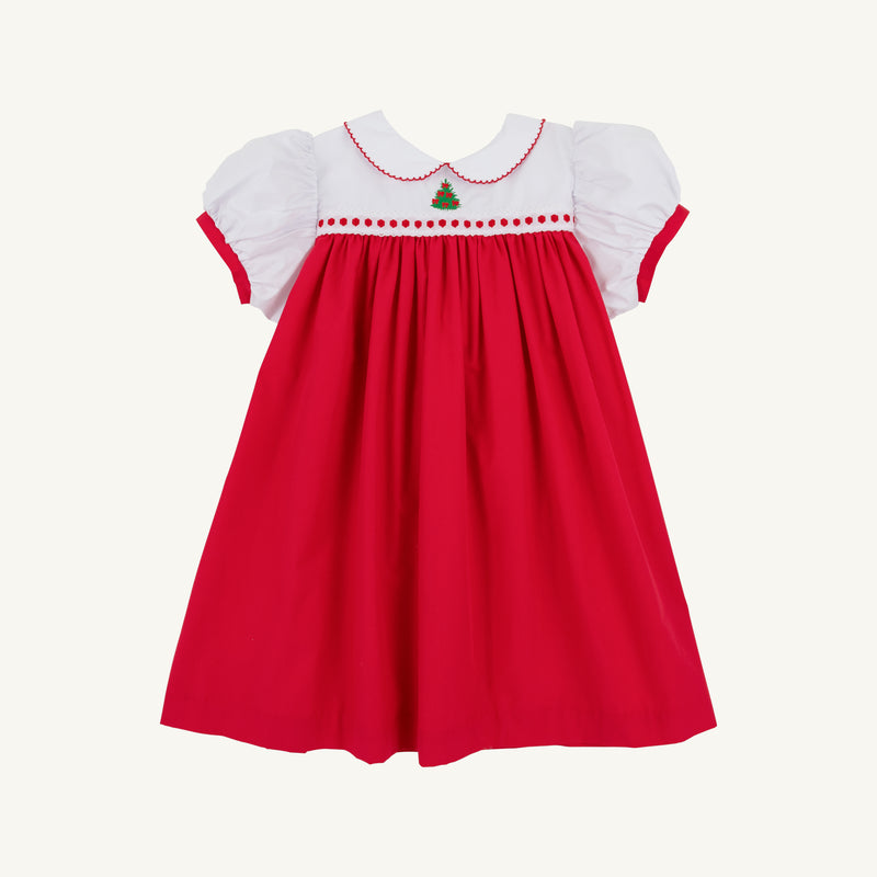 Mary Dal Dress - Richmond Red & Worth Avenue White with Christmas Tree by The Beaufort Bonnet Company: a charming holiday dress for girls featuring short puffed sleeves, a crisp white Peter Pan collar with red trim, and an embroidered green Christmas tree on the chest—perfect for the season.