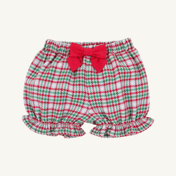 Natalie Knickers - Wicker Park Plaid with Richmond Red by The Beaufort Bonnet Company feature a classic red, green, and white plaid pattern, ruffled leg openings, and a charming red bow at the waistband—perfect for adding festive flair to your little one’s winter wardrobe. Shown against a plain white background.