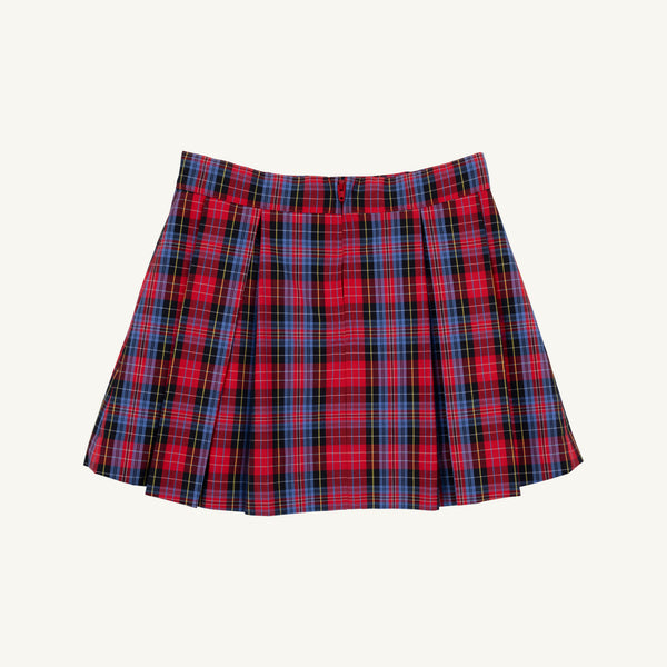The Parson Pleated Skirt - Bucktown Tartan by The Beaufort Bonnet Company features a preppy red plaid pattern with blue, green, and yellow lines, shown against a plain white background.