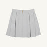 Parson Pleated Skirt - Grantley Gray Houndstooth featuring a gray and white houndstooth pattern, pleated design, and a gold back zipper.