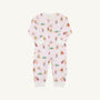 The Beaufort Bonnet Company Paxton Playsuit - Christmastime Cuties (Belwood Blush) with Palmetto Pearl features a baby onesie decorated with colorful cartoon animals and presents, long sleeves, white cuffs, and a front zipper, displayed flat on a plain white background.
