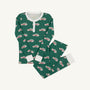 The Beaufort Bonnet Company’s Payton Pajama Set - Windsor Wagon (Grier Green) with Palmetto Pearl features green Christmas pajamas for children, accented with a white collar and cuffs and adorned with a repeating pattern of white and red station wagons. Crafted from soft Cotton Jersey Knit, the set includes a long-sleeve top and matching pants, displayed flat on a white background.