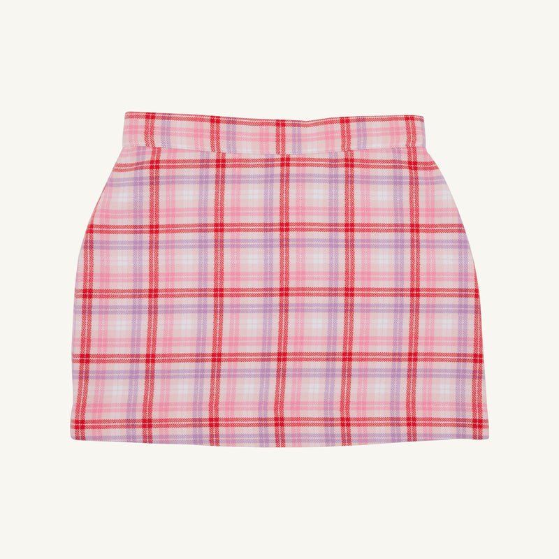 A pink, red, and purple Perrin Skirt - Broadway Play Plaid with a flat waistband, perfect as a girls winter skirt.