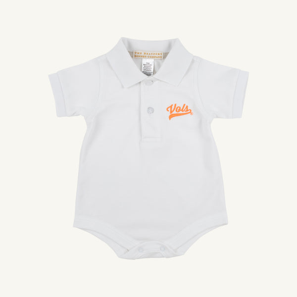 The Tennessee Prim & Proper Polo - Worth Avenue White by The Beaufort Bonnet Company is a white baby polo bodysuit featuring short sleeves, a button-down front, and “Vols” in orange script with an embroidered Tennessee logo on the left chest. Crafted from soft Pima Cotton Knit, this classic piece stands out against a plain white background.