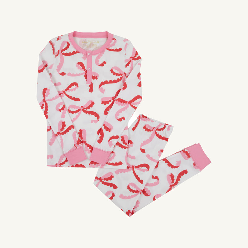 Sara Jane’s Sweet Dream Set - Bonnie Scot Bows with Hamptons Hot Pink: a white long-sleeved Pima cotton pajama set with a pink and red bow print, a henley neckline, and pink ribbed cuffs.