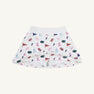 Crafted by The Beaufort Bonnet Company, the Florida Searcy Skort - Florida Forever with Worth Avenue White features a soft Pima Cotton Knit fabric with a comfortable elastic waistband. This white skort is adorned with the playful Florida Forever print, showcasing colorful footballs, pom-poms, pennants, letter Fs, and megaphones on a crisp background.