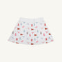 The Texas Searcy Skort - Gone to Texas with Worth Avenue White by The Beaufort Bonnet Company features a playful all-over Gone to Texas print showcasing red and blue pennants, cheerleader megaphones, pom-poms, and cow heads. This vibrant and colorful design pops against the crisp white background.