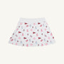 The Alabama Searcy Skort by The Beaufort Bonnet Company in Sweet Home Honey with Worth Avenue White features a playful pattern of maroon pennants, pink pom-poms, small cheerleader icons, and megaphones scattered across its soft Pima Cotton Knit fabric.