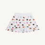 The Beaufort Bonnet Company’s Auburn Searcy Skort - Tiger Thrill with Worth Avenue White is a white children’s skort featuring Auburn University-themed logos, pennants, paw prints, cheer megaphones, and tigers in vibrant orange, navy, and pink—a sporty gameday outfit choice.