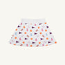 The Beaufort Bonnet Company’s Clemson Searcy Skort - Tiger Triumph with Worth Avenue White features a white, sporty skort with an elastic waistband, playfully patterned with orange paw prints, purple pennants, pink megaphones, and light blue bottles in a repeating design.