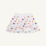 Clemson Searcy Skort - Tiger Triumph with Worth Avenue White by The Beaufort Bonnet Company, featuring orange paw prints, purple pennant flags, and blue and pink megaphone and pom-pom illustrations on a white background, displayed on a plain light surface.