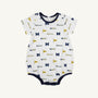 Dress your little one for game day in the Michigan Short Sleeve Patton Play Bubble - Bold in Blue with Michigan Blue by The Beaufort Bonnet Company. This adorable white baby romper is made from soft Pima Cotton Knit and features short sleeves, navy trim on the collar, sleeves, and leg openings, and a playful design with repeating University of Michigan logos, blue “M” letters, yellow flags, and “Wolverines” text—making it the perfect outfit for your future fan!.