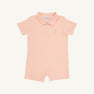 Sir Proper’s Romper - Seashore Sherbet Stripe with Multicolor Stork, by The Beaufort Bonnet Company, is a short-sleeve baby romper featuring a pale pink and white striped pattern called Seashore Sherbet Stripe. The romper includes a collar, button placket, and short legs, and is crafted from soft Pima cotton. It is shown laid flat on a white background.