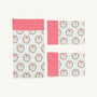 Add festive charm to your holiday table setting with the Sleep Tight Sheet Set - North Pole Portrait with Richmond Red Stripe by The Beaufort Bonnet Company, featuring a cheerful Christmas-themed design of red and white stripes paired with Santa Claus faces framed by holly wreaths on a crisp white background.