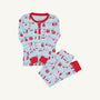 Children’s two-piece Sutton’s Sweet Dream Set - Santa’s Laundry Line with Richmond Red by The Beaufort Bonnet Company, featuring light blue pajamas with vibrant red trim and a charming print of Santa’s laundry—mittens, socks, sweaters, and scarves—hanging on clotheslines. This cozy set includes a long-sleeve top and matching pants, making it perfect for family matching pajamas during the holiday season.